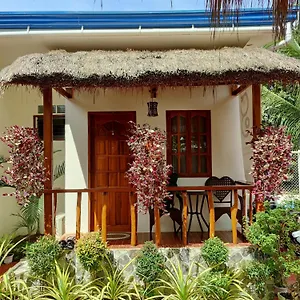https://glorias-1-inn.hotelspanglao.com